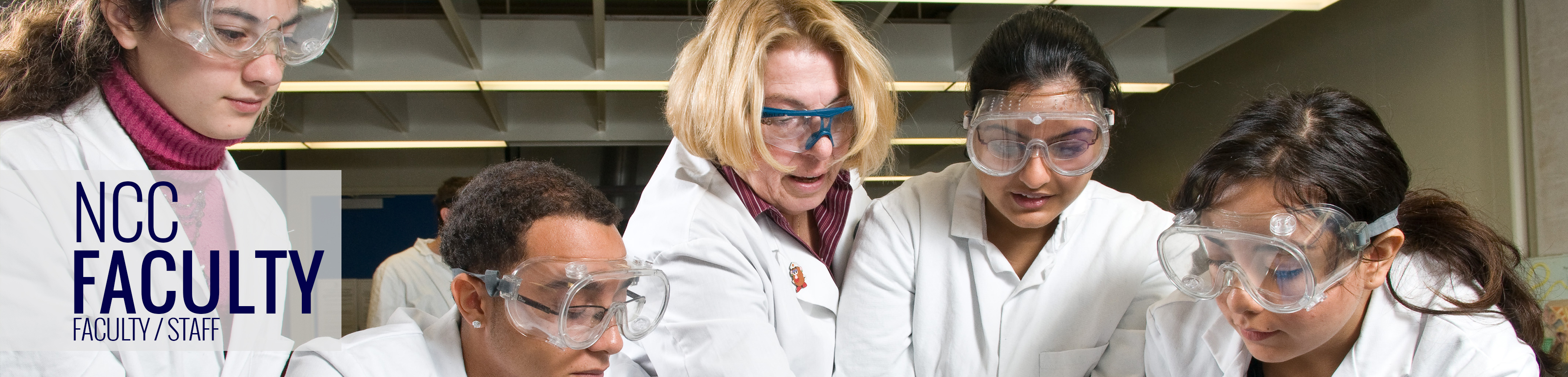 NCC faculty / staff. Photo of faculty member and students in a lab.